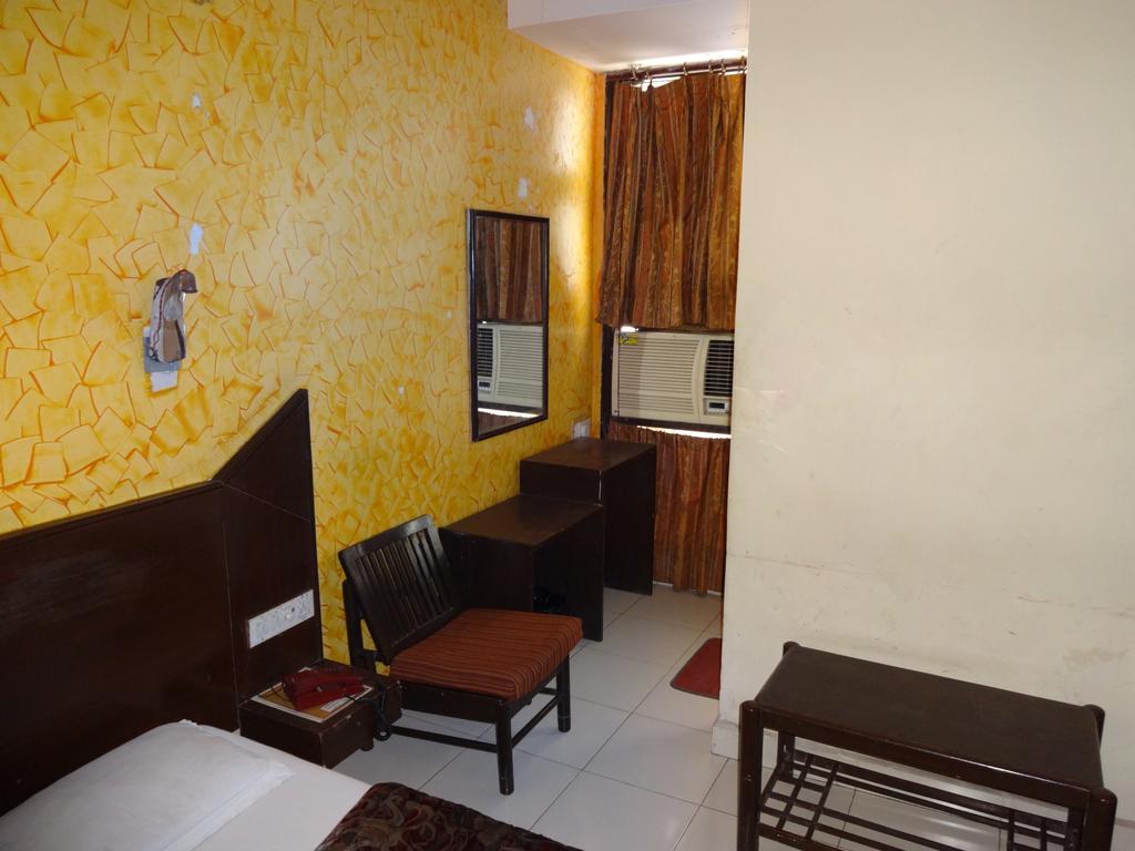Hotel Elegant International New Delhi Rom bilde